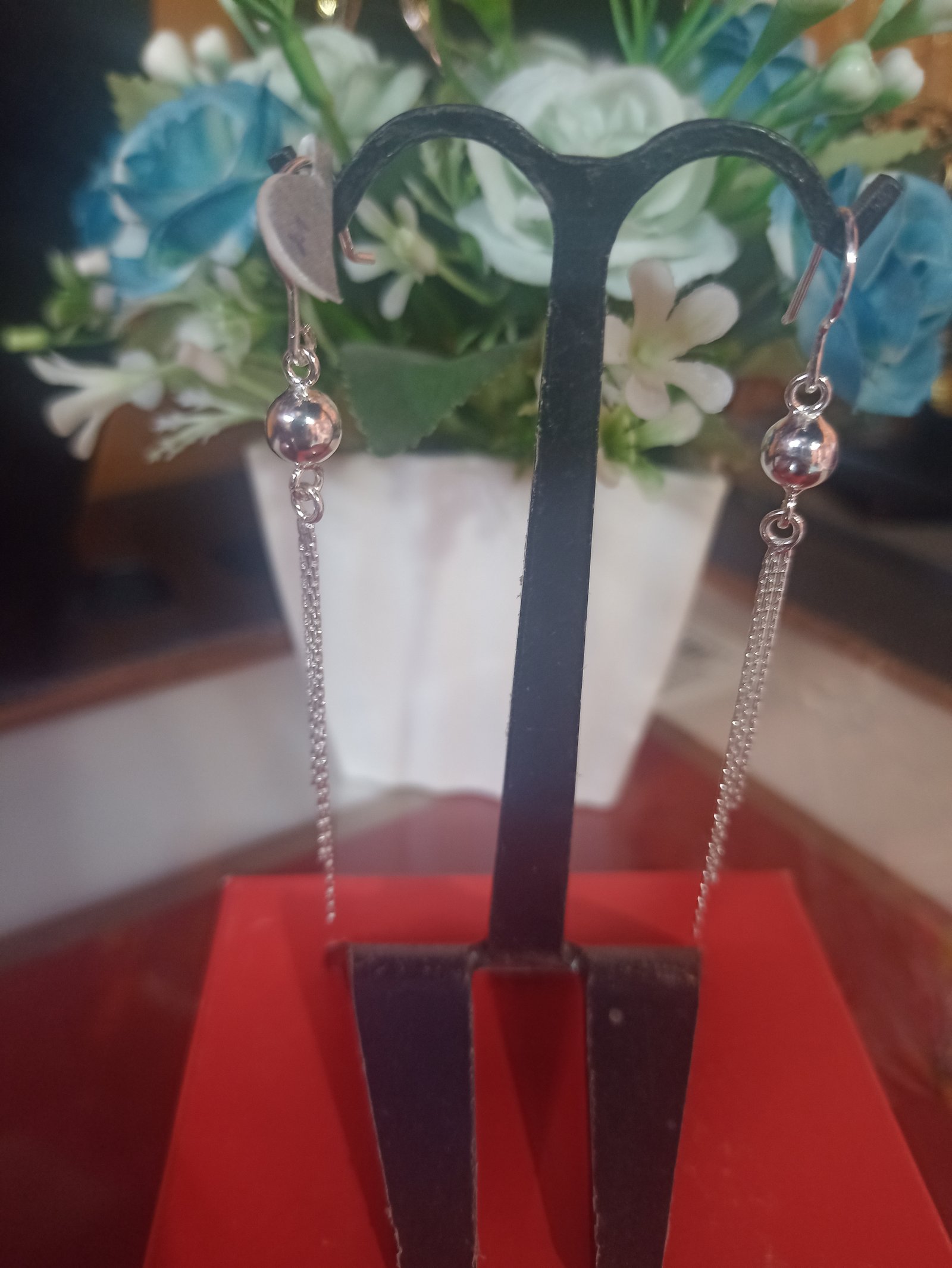 Aretes largos de bolita