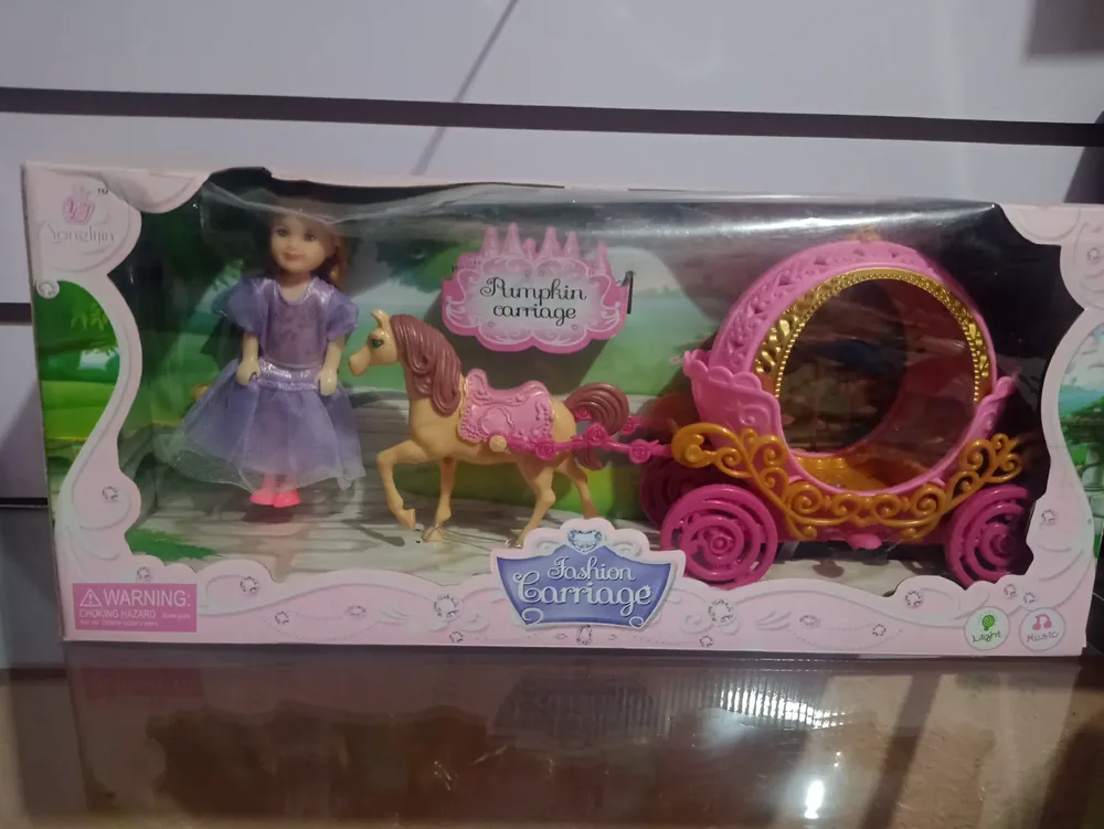 Muñeca Carruaje